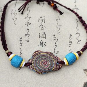 bracelet spirale artisanal en argile polymère bijou réglable inspiration ciel orage