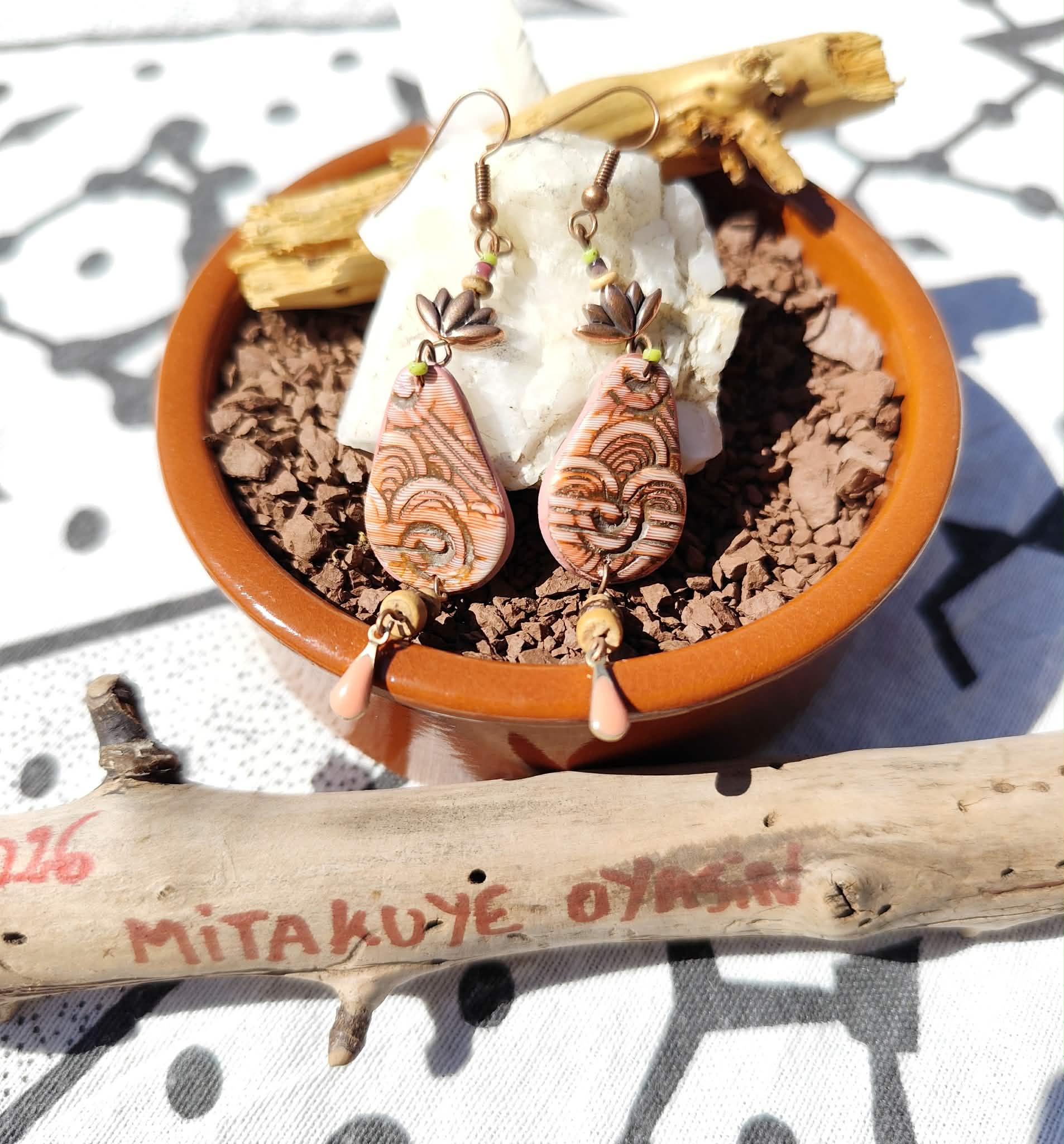 bouclesdoreillesgouttescoucherdusoleil4